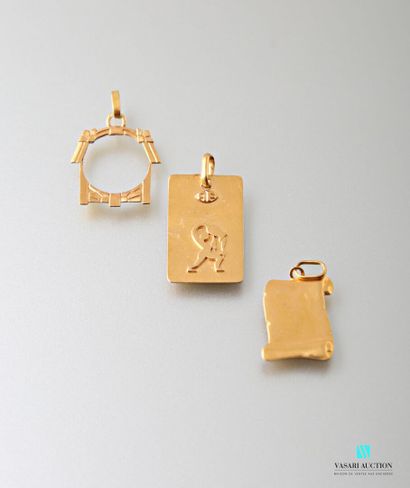 null Three pendants in yellow gold 750 thousandths: a plate decorated with the symbol...