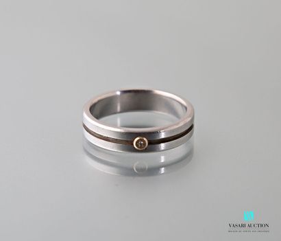 null Steel ring decorated with a small diamond in a closed gold setting
Finger size...