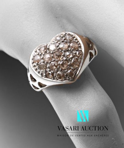 null Silver ring in the shape of a heart paved with champagne diamonds, the shoulder...