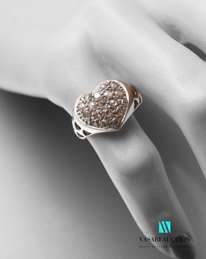 null Silver ring in the shape of a heart paved with champagne diamonds, the shoulder...