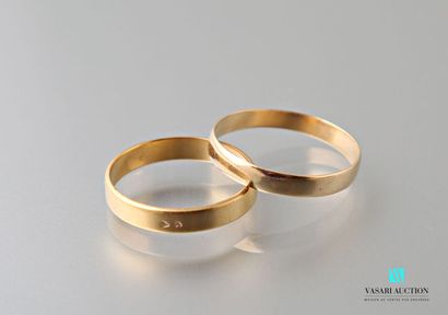 null Two rings in yellow gold 750 thousandth
Weight : 5,1 g 
