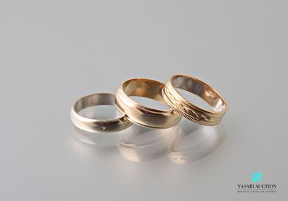 null Three wedding rings in gold 750 thousandths 
Weight : 10,8 g

