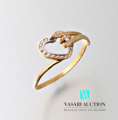 null Ring in yellow gold 750 thousandths with heart motif, set with a brilliant of...
