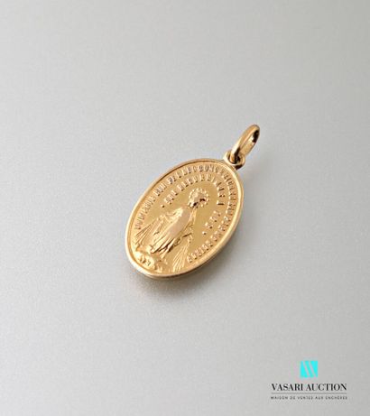 null Medal in yellow gold 750 thousandth of the miraculous Virgin 
Weight : 2,5 g...