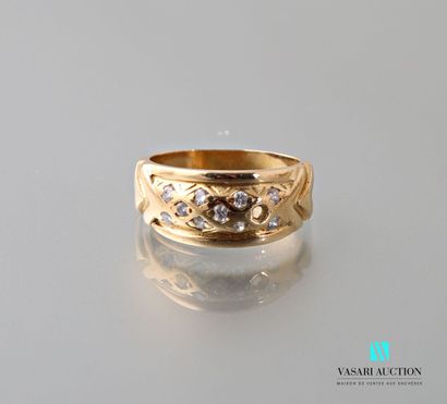 null Ring in yellow gold 750 thousandth, central motif set with ten diamonds of about...