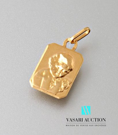 null Octagonal medal in yellow gold 750 thousandths "Child holding flowers". Back...