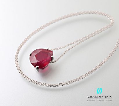 null White gold necklace with a pendant set with a pear-cut ruby of about 6 carats,...