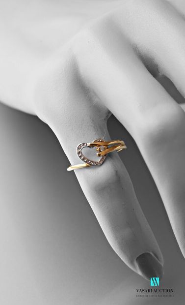 null Ring in yellow gold 750 thousandths with heart motif, set with a brilliant of...