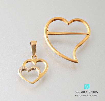 null A brooch and a pendant Heart in yellow gold 750 thousandths 
Weight : 2,7 g...