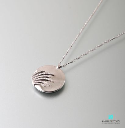 null A long chain in white gold 750 thousandths jaseron mesh and a round pendant...