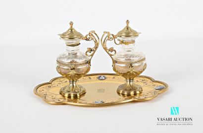 null Pair of gilded metal cruets and engraved glasses decorated with vine branches...