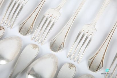 null Lot including a suite of twelve silver-plated cutlery, the handle with flared...