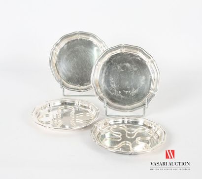 null Suite of four silver plated metal coasters of round form, the edge with contours...
