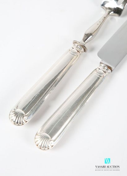 null Cutlery for carving, the handle in filled silver with decoration of nets is...