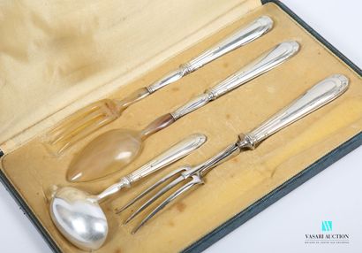 null Set including a carving fork, a sauce spoon and a salad server, the ends in...