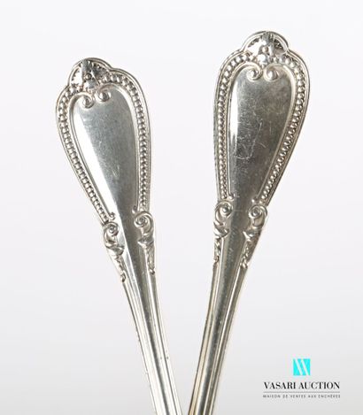 null Silver fish serving utensil, the handle decorated with fillets finished by a...