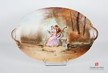 null LIMOGES
Porcelain dish of oblong form decorated with a gallant scene of a minstrel...