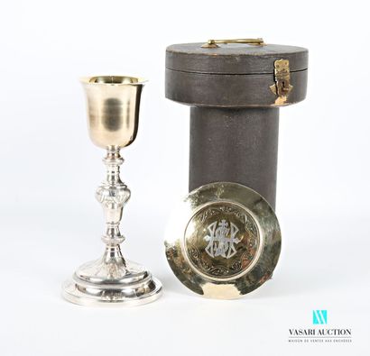 null Chalice, it rests on a silver-plated metal base with a round doucine decorated...