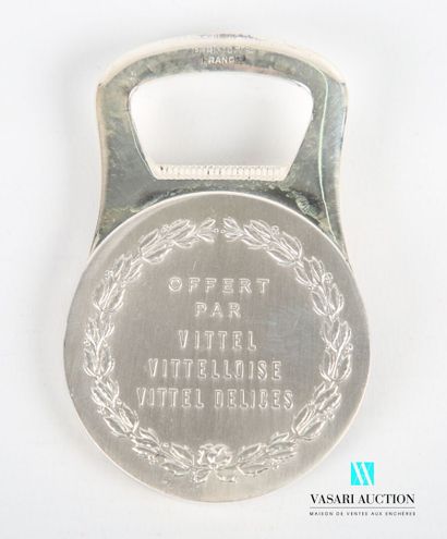 null Silver plated metal bottle opener, the grip showing a medal with on the obverse...