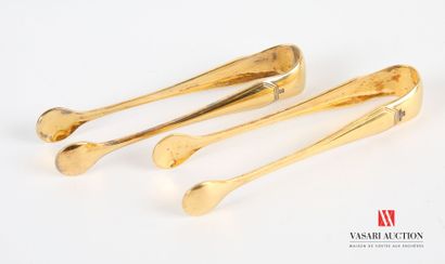 null Pair of sugar tongs in gilded metal the arms decorated with nets model America.
Goldsmith...