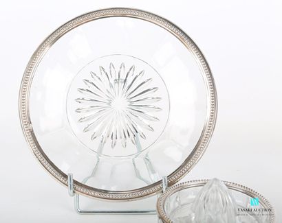 null Lemon squeezer and its plate of presentation out of moulded glass, the silver...