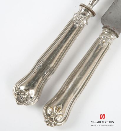 null Cutlery for carving, the handle in silver plated metal violoné hemmed with nets...