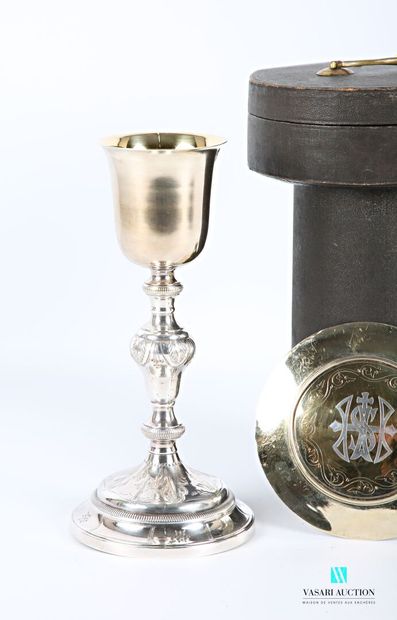 null Chalice, it rests on a silver-plated metal base with a round doucine decorated...