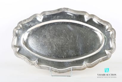 null Oval-shaped silver dish, the border with contours hemmed with nets and crossed...