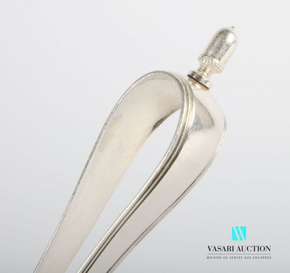 null Silver sugar tongs, the arms decorated with nets are finished by spoons, it...