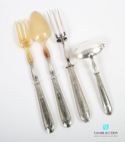 null Set including a carving fork, a sauce spoon and a salad server, the ends in...