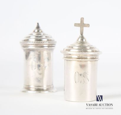 null Two boxes for the Holy Oils in silver of tubular form, the lid hemmed with a...