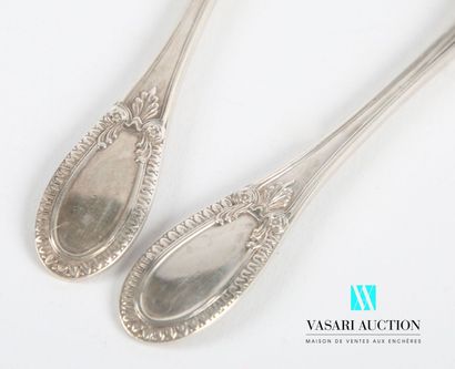null Two silver candy set cutlery, the handle hemmed with nets is finished by a mandorla...