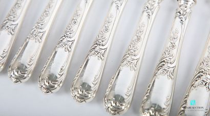 null Twelve dessert knives in silver plated metal, the handle decorated with nets,...