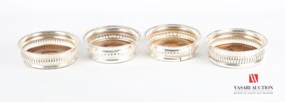 Set of four silver coasters of similar models...
