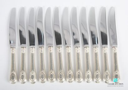 null Suite of twelve dessert knives, the handle in plain silver plated metal is finished...