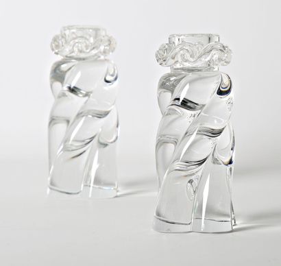 null BACCARAT
Pair of translucent crystal candlesticks, the helicoidal shaft, the...