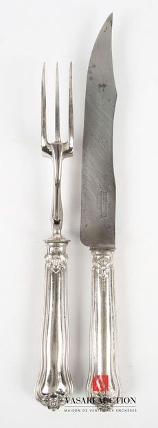 null Cutlery for carving, the handle in silver plated metal violoné hemmed with nets...