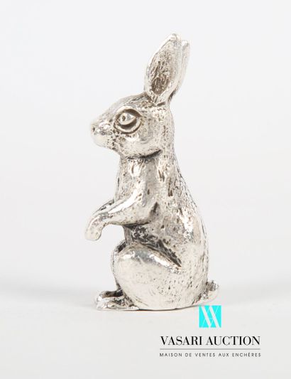 Silver subject representing a rabbit sitting...