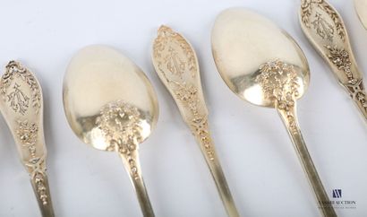 null Suite of twelve silver gilt tea spoons, the handle decorated with nets, asparagus...