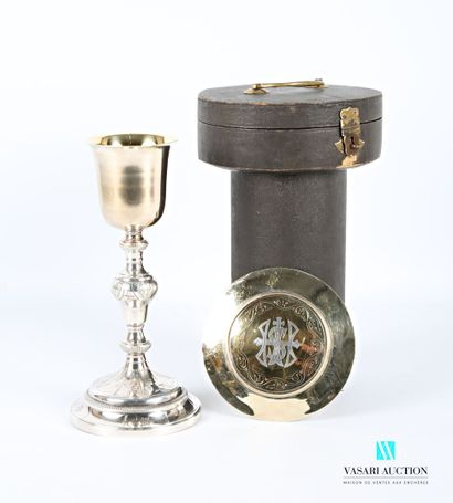 null Chalice, it rests on a silver-plated metal base with a round doucine decorated...