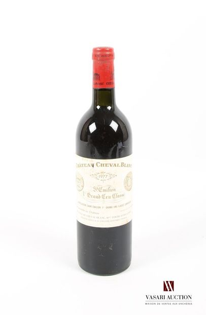 null 1 bouteille	Château CHEVAL BLANC	St Emilion 1er GCC	1977
	Et. un peu fanée et...