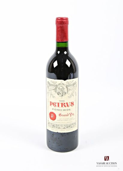 1 bouteille	PÉTRUS	Pomerol	1988
	Et. un peu...