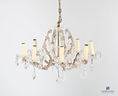 null Chandelier in metal and glasses with four double arms presenting eight lights....
