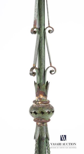 null Antique green patinated metal floor lamp standing on three inverted console...