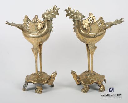 null ASIA
Pair of gilt bronze subjects representing waders on a turtle 
20th century
Height...
