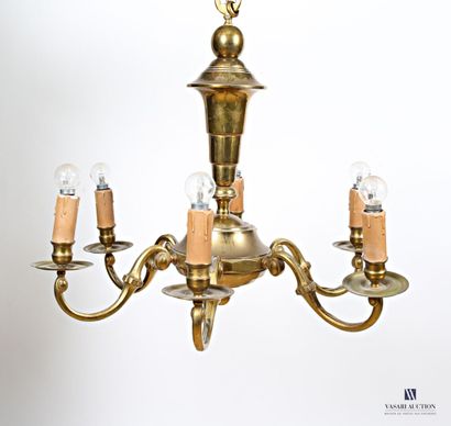 null Gilded brass chandelier, the conical shaft is finished by a spinning top supporting...