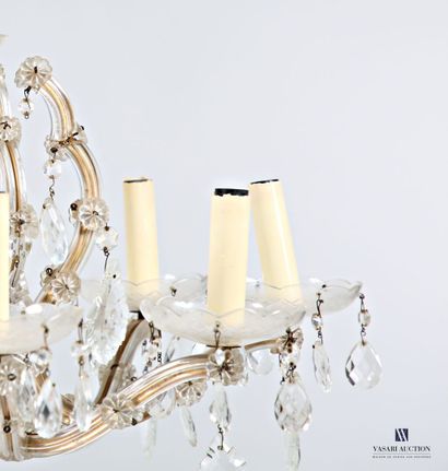null Chandelier in metal and glasses with four double arms presenting eight lights....