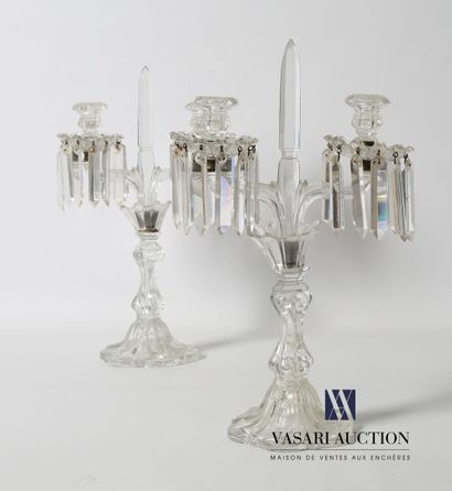 null Pair of crystal candlesticks, the shaft godronné ending in obelisk and resting...