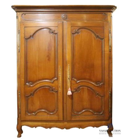 null Small cabinet in molded and carved fruitwood decorated with a sunflower in the...