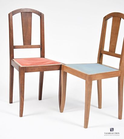 null Two chairs in natural wood and stained natural wood, the openwork back has a...